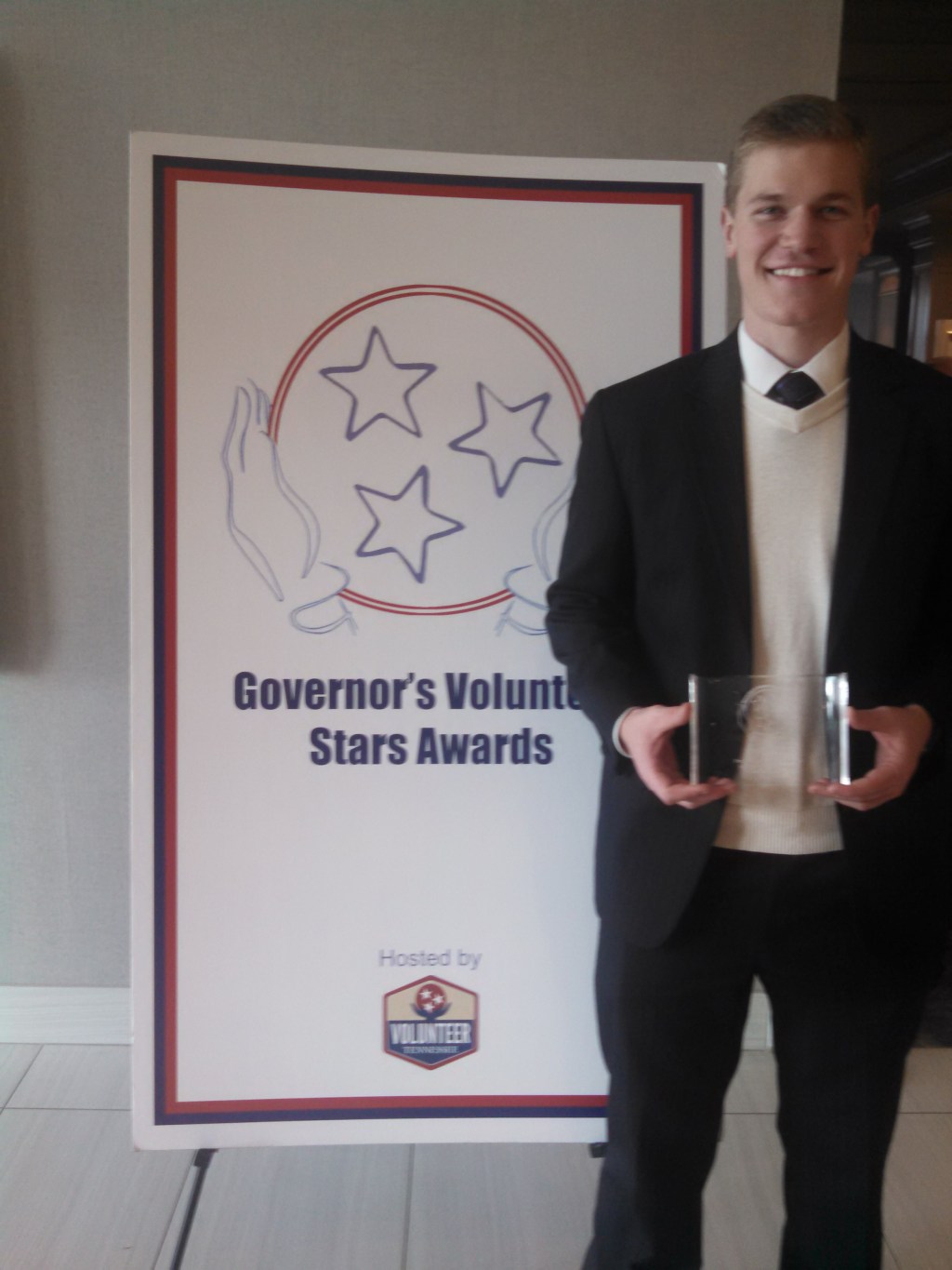 Stephen May Receives Honor for Volunteer Service